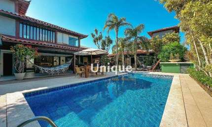 Casa em condomínio pé na areia à venda na praia de Manguinhos por R$ 5.700.000,00