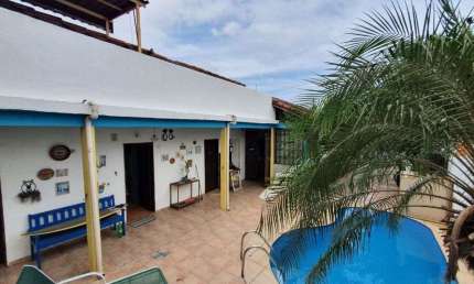 Pousada com 8 dormitórios à venda, 268 m² por R$ 1.400.000,00 - Jardim Aclimação - Praia Grande/SP