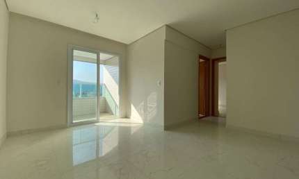 Apartamento com 2 dormitórios à venda, 70 m² por R$ 520.000,00 - Caiçara - Praia Grande/SP