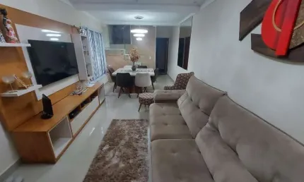 Sobrado com 3 dormitórios à venda, 109 m² por R$ 950.000,00 - Boqueirão - Praia Grande/SP