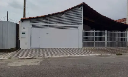 Casa com 2 dormitórios à venda, 95 m² por R$ 450.000,00 - Caiçara - Praia Grande/SP
