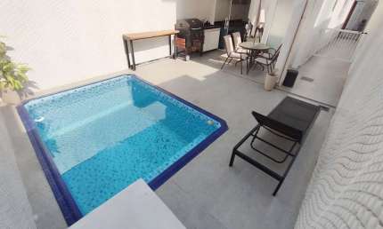 Sobrado com 3 dormitórios à venda, 120 m² por R$ 850.000,00 - Vila Guilhermina - Praia Grande/SP