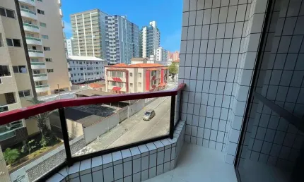 Apartamento com 2 dormitórios para alugar, 84 m² por R$ 3.300,02/mês - Vila Guilhermina - Praia Grande/SP