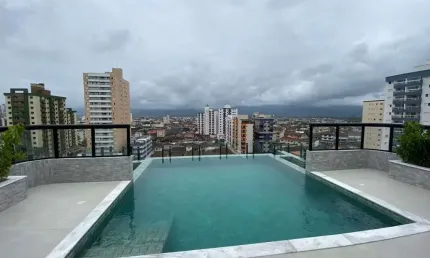 Apartamento com 2 dormitórios à venda, 57 m² por r$ 544.803,34 - tupi - praia grande/sp