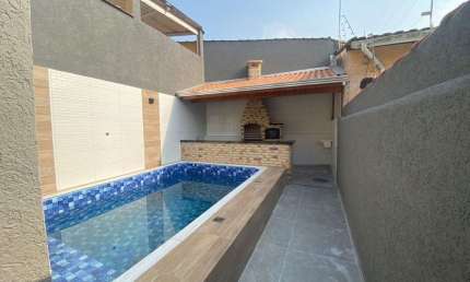 Casa com 2 dormitórios à venda, 112 m² por R$ 720.000,00 - Vila Caiçara - Praia Grande/SP