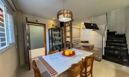 Sobrado com 3 dormitórios à venda, 101 m² por R$ 905.000,00 - Vila Guilhermina - Praia Grande/SP