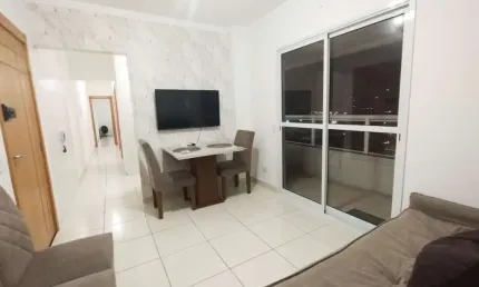 Apartamento com 2 dormitórios para alugar, 64 m² por R$ 3.200,01/mês - Caiçara - Praia Grande/SP