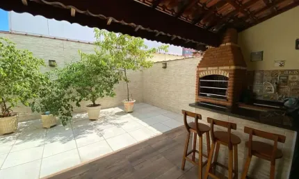 Sobrado com 3 dormitórios à venda, 154 m² por R$ 750.000,00 - Tupi - Praia Grande/SP