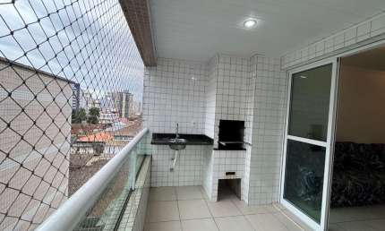 Apartamento com 2 dormitórios para alugar ou comprar na Vila Guilhermina em Praia Grande/SP
