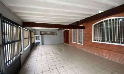 Casa com 3 dormitórios à venda, 120 m² por R$ 650.000,00 - Vila Guilhermina - Praia Grande/SP