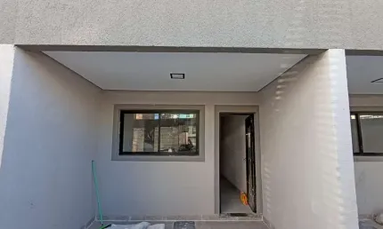 Sobrado com 3 dormitórios à venda, 108 m² por R$ 670.000,00 - Vilamar - Praia Grande/SP