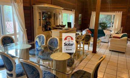 Casa com 3 dormitórios à venda, 322 m² por R$ 1.970.000,00 - Condomínio Vale do Sol - Tremembé/SP