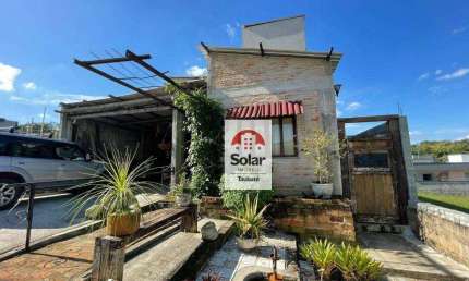 Casa com 2 dormitórios à venda, 199 m² por R$ 780.000,00 - Condomínio Cataguá Way Sul - Taubaté/SP