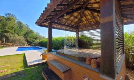 Casa com 3 dormitórios, 349 m² - venda por R$ 2.100.000,00 ou aluguel por R$ 8.691,00/mês - Chácaras Cataguá - Taubaté/SP