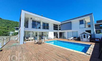 Casa em condomínio fechado com 4 quartos à venda na Rodovia Admar Gonzaga, 3180, Itacorubi, Florianópolis, 343 m2 por R$ 3.900.000