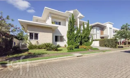 Casa em condomínio fechado com 4 quartos à venda na Rodovia Doutor Antônio Luiz Moura Gonzaga, 3825, Rio Tavares, Florianópolis, 328 m2 por R$ 4.999.000