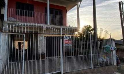 Casa com 3 quartos à venda na Irmã Arsenia Erthal, 149, Jardim Algarve, Alvorada, 110 m2 por R$ 400.000