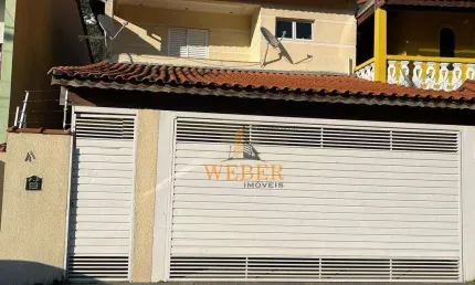 Sobrado com 3 dormitórios à venda, 87 m² por R$ 650.000,00 - Jardim Santa Rita - Embu das Artes/SP