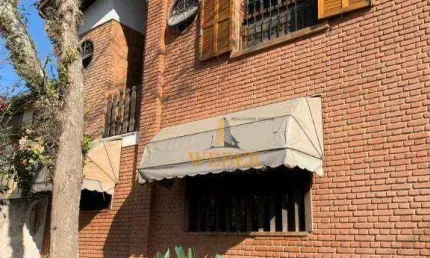 Casa com 4 dormitórios à venda, 254 m² por R$ 999.900,00 - Vila Carmem - Embu das Artes/SP