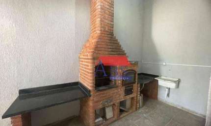 Casa com 3 dormitórios à venda, 172 m² por R$ 750.000,00 - Vila Guilhermina - Praia Grande/SP