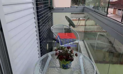 Casa com 3 dormitórios à venda, 110 m² por R$ 380.000,00 - Vila Voturuá - São Vicente/SP