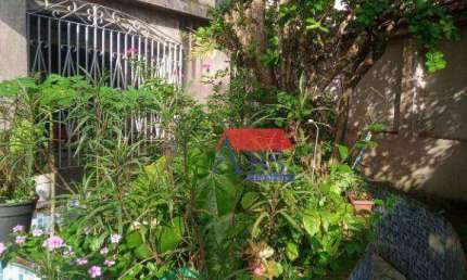 Sobrado de esquina com 3 dormitórios à venda, 215 m² por R$ 650.000 - Vila Nova - Cubatão/SP