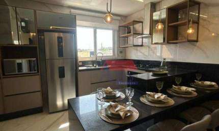 Casa com 2 dormitórios à venda, 96 m² por R$ 550.000,00 - Vila Guilhermina - Praia Grande/SP