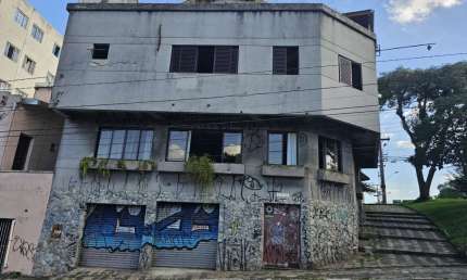 Casa com 4 quartos à venda na Rua Presidente Carlos Cavalcanti, São Francisco, Curitiba por R$ 900.000