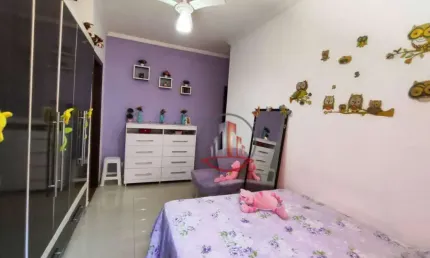Casa com 2 dormitórios à venda por R$ 495.000 - Caiçara - Praia Grande/SP