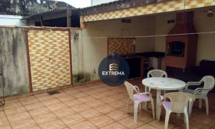 Sobrado com 3 dormitórios à venda, 178 m² por R$ 530.000,00 - Tude Bastos (Sítio do Campo) - Praia Grande/SP