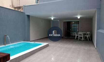 Casa com 3 dormitórios à venda, 129 m² por R$ 625.000,00 - Caiçara - Praia Grande/SP