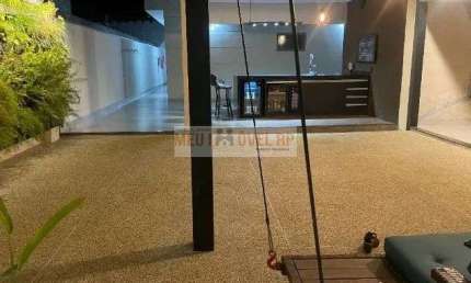Casa com 3 dormitórios à venda, 320 m² por R$ 955.000 - Jardim Anhangüera - Ribeirão Preto/SP