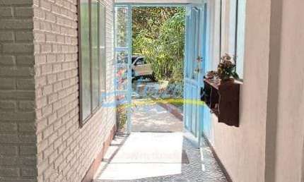 Casa com 4 dormitórios à venda, 275 m² por R$ 3.000.000,00 - Condomínio Santa Fé - Vinhedo/SP