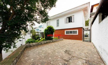 ** sobrado de 3 dormitórios sendo 1 suíte com 3 vagas de garagem e quintal - 279m² de terreno e 199m² de área construída - boa localização **