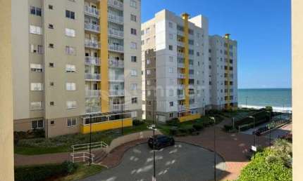 Apartamento pé na areia a venda em Barra Velha, mobiliado