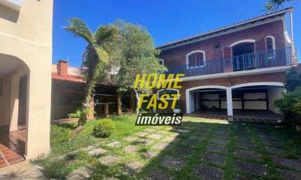 Sobrado com 4 dormitórios à venda, 442 m² por R$ 1.980.000 - Vila Augusta - Guarulhos/SP