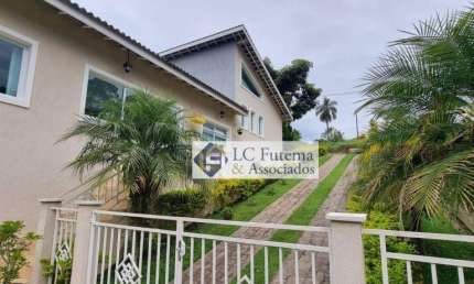 Casa com 3 dormitórios à venda, 287 m² por R$ 1.700.000,00 - Recanto Suíço - Vargem Grande Paulista/SP