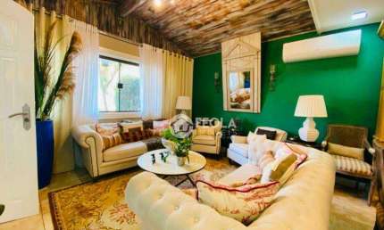 Casa com 3 dormitórios à venda, 170 m² por R$ 1.300.000,00 - Iate Clube de Americana - Americana/SP