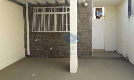 Sobrado 2 dormitórios,entrada lateral,sala,quintal,2 vagas de garagem,ótima localização,aceita proposta.