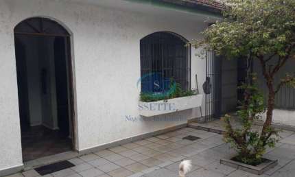 Casa Térrea com 4 dormitórios,1 suíte,2 salas,4 banheiros,entrada lateral,4 vagas de garagem,aceita proposta.