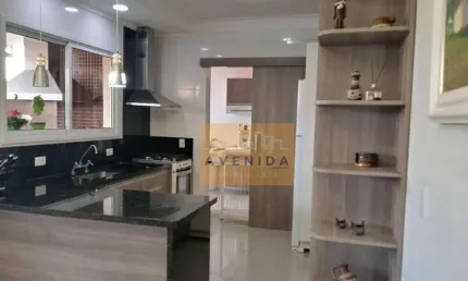 Casa com 3 dormitórios à venda, 200 m² por R$ 1.800.000,00 - Condomínio Terras do Cancioneiro - Paulínia/SP