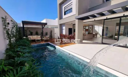 Casa com 3 dormitórios à venda, 260 m² por r$ 2.500.000,00 - condomínio reserva dos ipês - uberlândia/mg