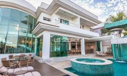 Casa alto padrão no condomínio Gênova com quatro suítes e área gourmet completa.
