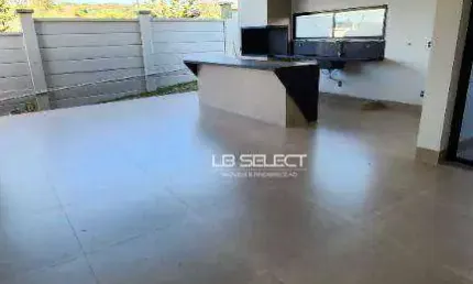 Casa no condomínio terras alpha com três suítes e área gourmet completa.