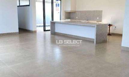 Casa no Condomínio Alphaville I com três suítes, escritório com lavabo e área gourmet.