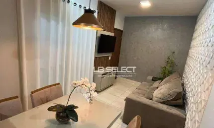 Apartamento no bairro Jardim Espanha com dois quartos, sacada, armários e elevador.