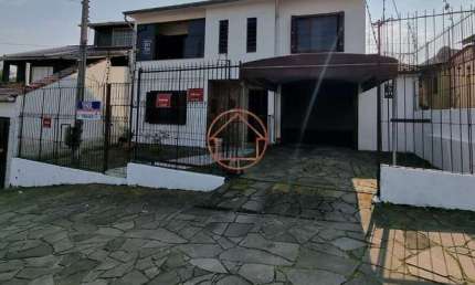 Casa com 3 quartos à venda na Avenida Valado, 158, Vila João Pessoa, Porto Alegre por R$ 598.000