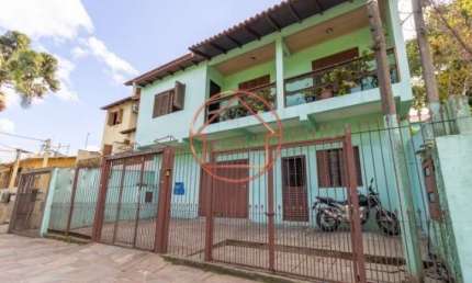 Casa com 3 quartos à venda na Rua Guadalajara, 115, Jardim Itu Sabará, Porto Alegre por R$ 685.000