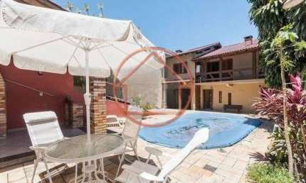 Casa com 4 quartos à venda na Rua Francisca Lechner, 343, Parque Santa Fé, Porto Alegre por R$ 650.000