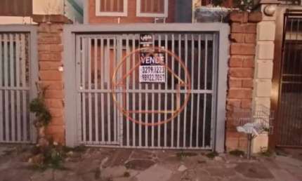 Casa com 3 quartos à venda na Rua Luiz Fontoura Júnior, 125, Jardim Itu Sabará, Porto Alegre por R$ 797.000